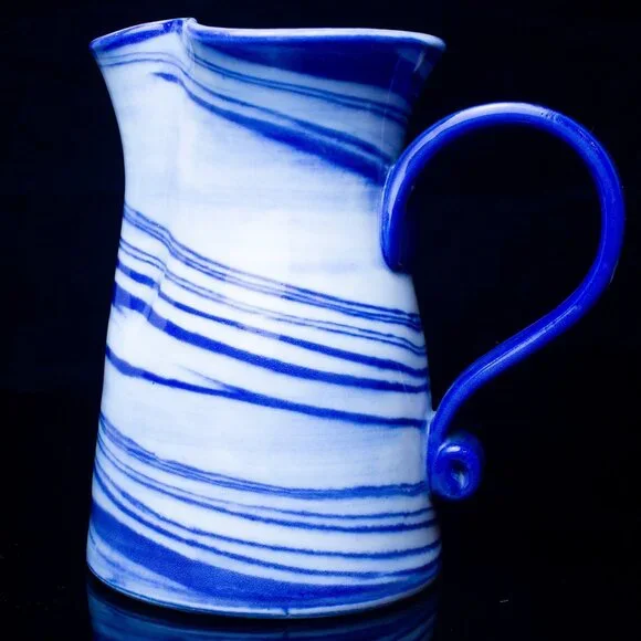 Handcrafted Blue & White Ceramic Pitcher With Swirl Design - Unique Wavy Rim - Picture 4 of 8